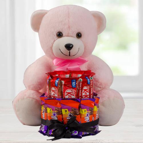 Marvelous 2 Tier Chocolate Arrangement with a Pink Teddy