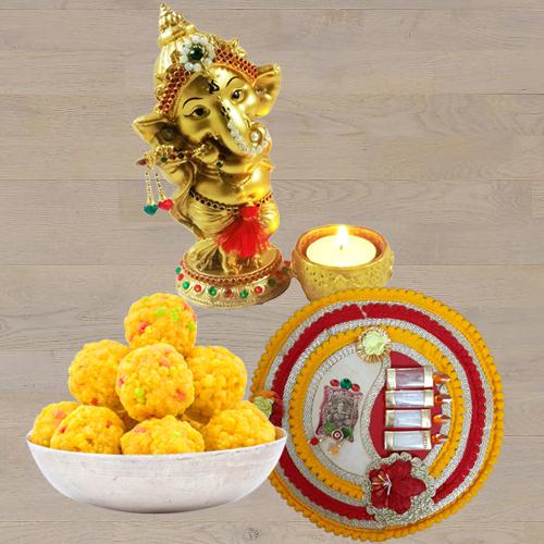 Marvelous Ganesha Idol with Boondi Ladoo N Thali<br>