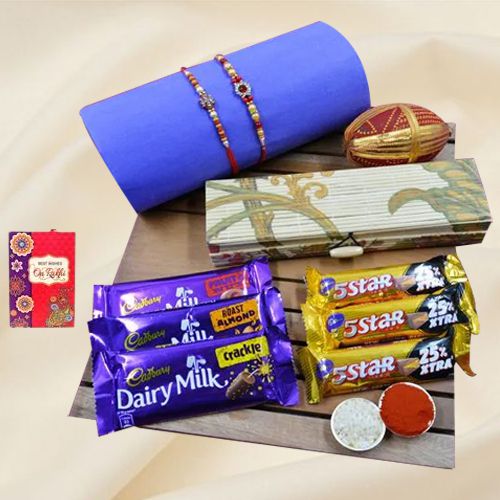 Dazzling Stone Rakhi Set N Cadbury Assortments in Bamboo Box