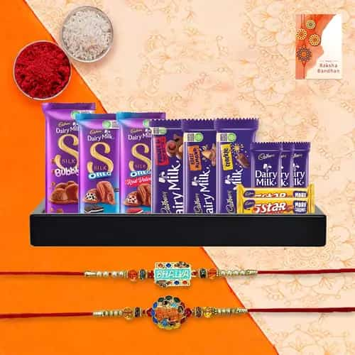 Splendid Twin Rakhi with Cadbury Chocolate Treat Hamper